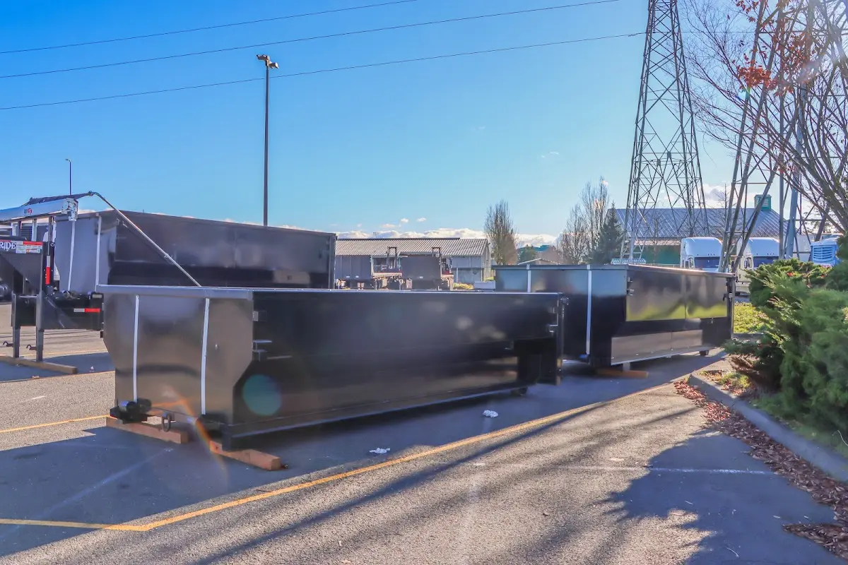 Roll-off dumpster ready for waste disposal at job site for 3 Yard Dumpster Rental in Arvin
